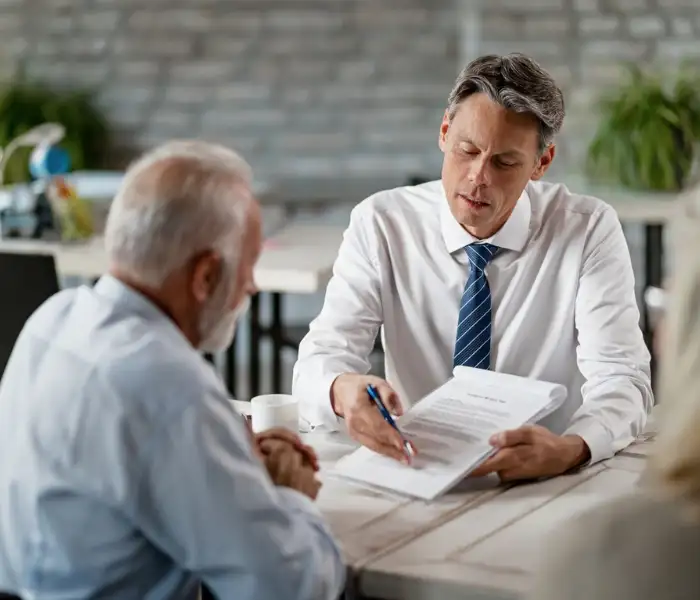 Financial advisor reviewing documents with senior client for Pathway Financial in Lancaster PA
