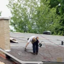 Roofing contractors installing new shingles for Echo Valley Roofing, Lancaster PA