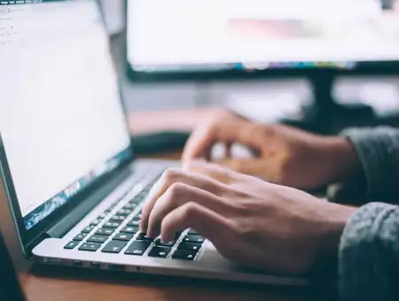 Gumption local website design close up of hands typing on laptop for Lancaster PA business