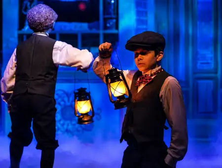 Magic and Wonder Dinner Theater young performers holding lanterns on stage in Paradise PA