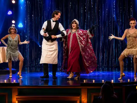 Magic and Wonder Dinner Theater cast singing together on stage in Paradise PA
