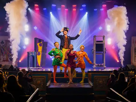 Magic and Wonder Dinner Theater cast posing with smoke effects on stage in Paradise PA