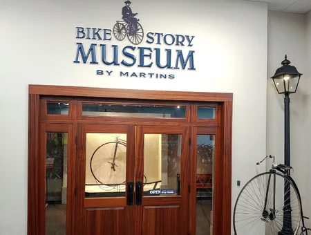 Bike Story Museum by Martins entrance with penny farthing bicycle and vintage signage in Lancaster PA