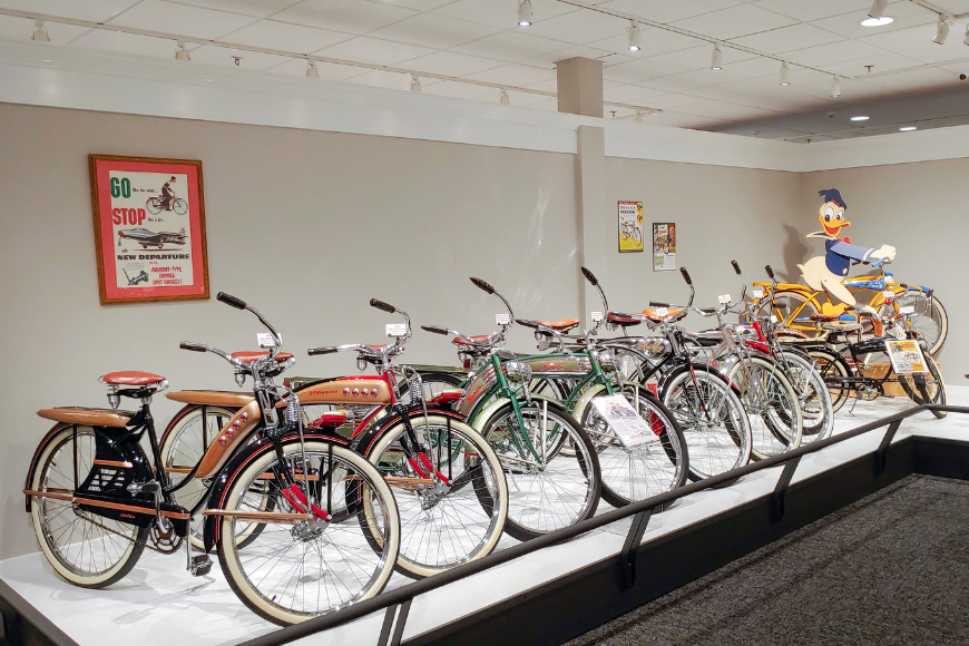 Bike Story Museum by Martins vintage cruiser bicycle gallery display with antique posters in Lancaster PA