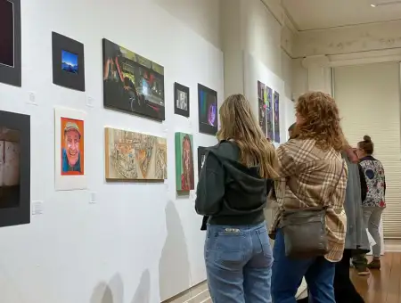 Demuth Foundation visitors viewing artwork exhibit in Lancaster PA gallery