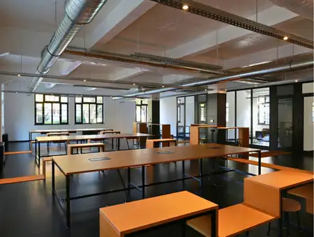 Our Town Management open concept office rental space with exposed ceiling in Lancaster PA