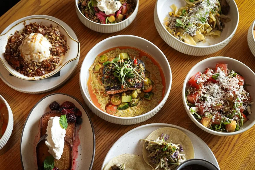 Overhead spread of farm to table dishes and desserts at Plough Restaurant Lancaster PA