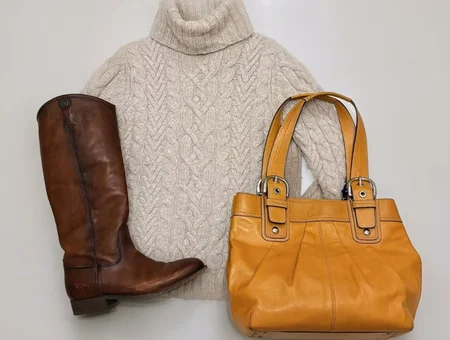 Purple Turtle Consignment Boutique flat lay of leather boots, cable knit sweater, and tote bag, Lancaster PA resale fashion