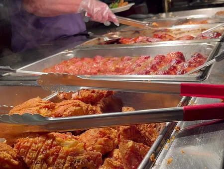 Fried chicken and ribs buffet line at Shady Maple Smorgasbord Lancaster PA