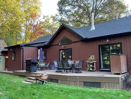 Composite deck addition with outdoor living space by Skyline Exteriors, Lancaster PA