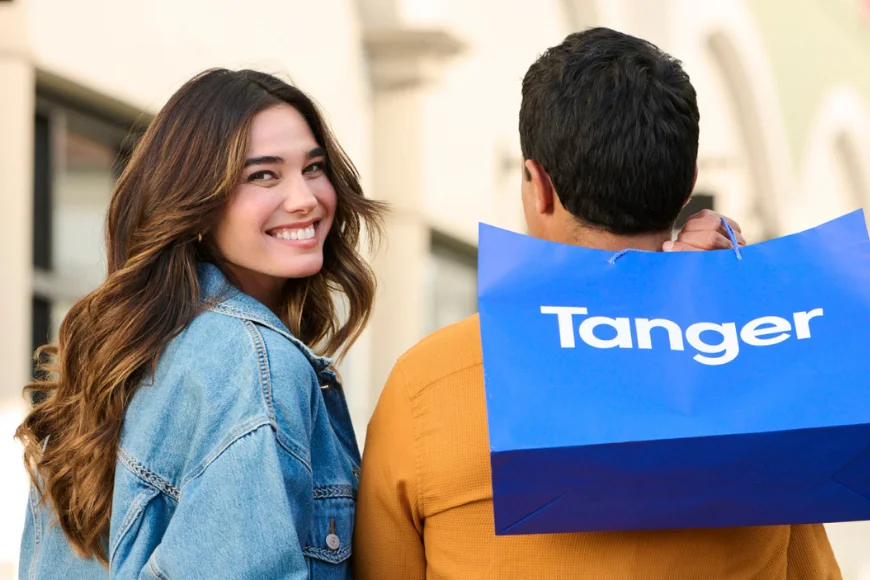 Couple smiling with Tanger shopping bag close up, Tanger Outlets Lancaster PA