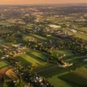 Aerial view of Lancaster County PA towns, farmland, and villages at sunset
