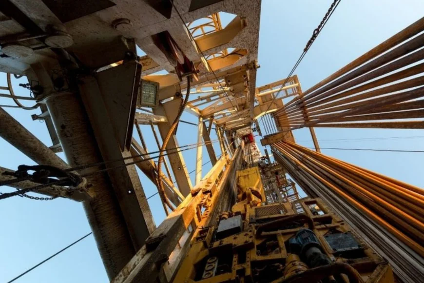 Looking straight up drilling rig tower against blue sky for Trinity Drilling and Blasting in Lancaster PA