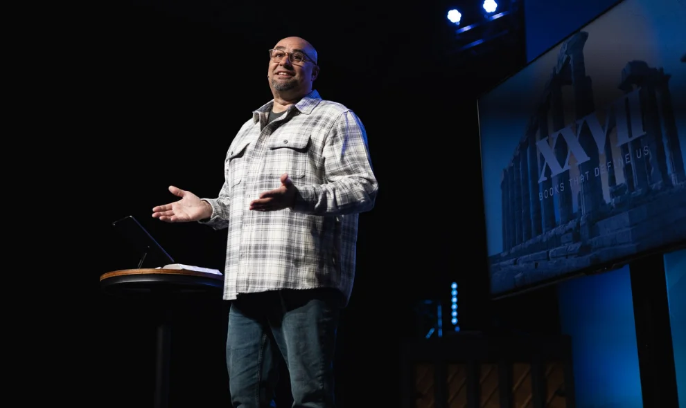 Pastor speaking on stage during a sermon at Victory Church in Lancaster PA