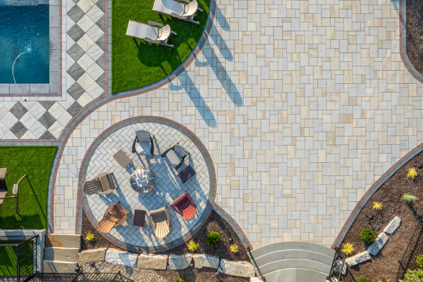 Aerial view of paver patio and pool landscaping by Willow Gates Home & Landscape in Lancaster PA