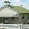 One-room Amish schoolhouse with bell tower in Lancaster County, Pennsylvania