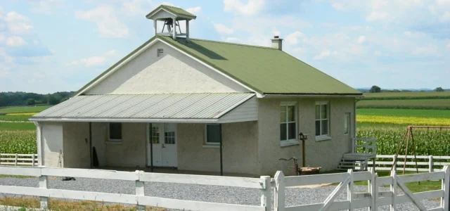 One-room Amish schoolhouse with bell tower in Lancaster County, Pennsylvania