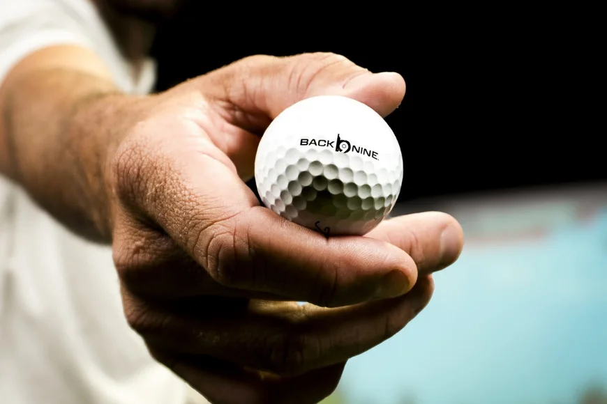 Back Nine golf ball in hand Lancaster PA golf gear