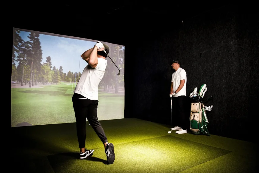 Golfers using indoor simulator Back Nine Golf Lancaster PA