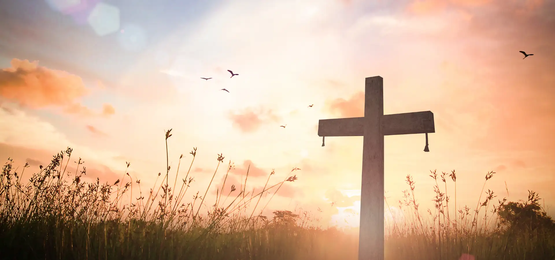 Wooden cross at sunrise in field Easter Lancaster County PA