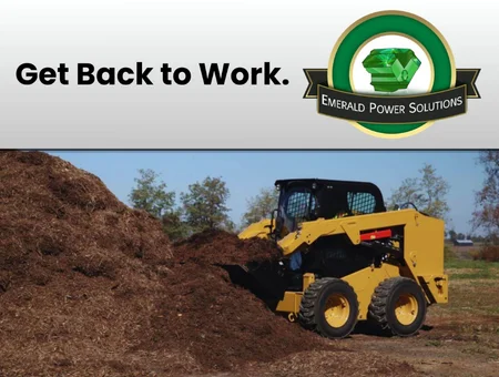 Skid steer loader moving mulch pile for Emerald Power Solutions Lancaster PA