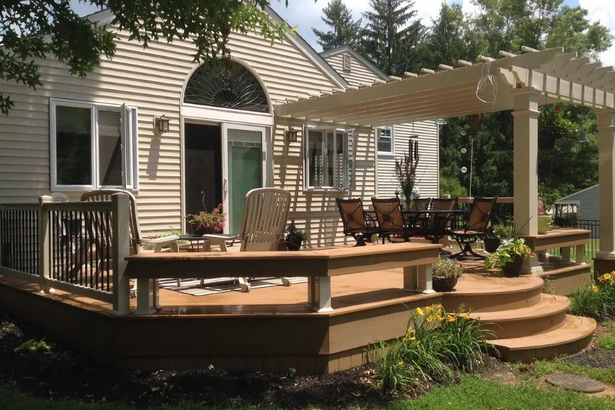Curved wood deck with pergola and dining set built by Forest Ridge Builders Lancaster PA