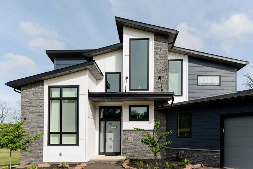 Modern two story home with stone and dark siding built by Forest Ridge Builders Lancaster PA