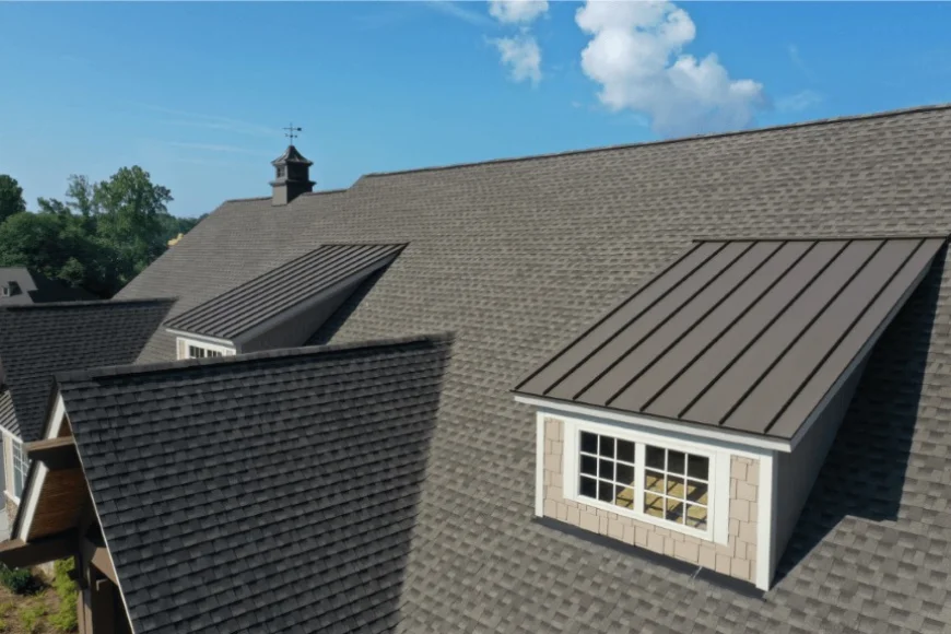 Close up of shingle roof with metal dormer roof by Indian Run Roofing Lancaster PA